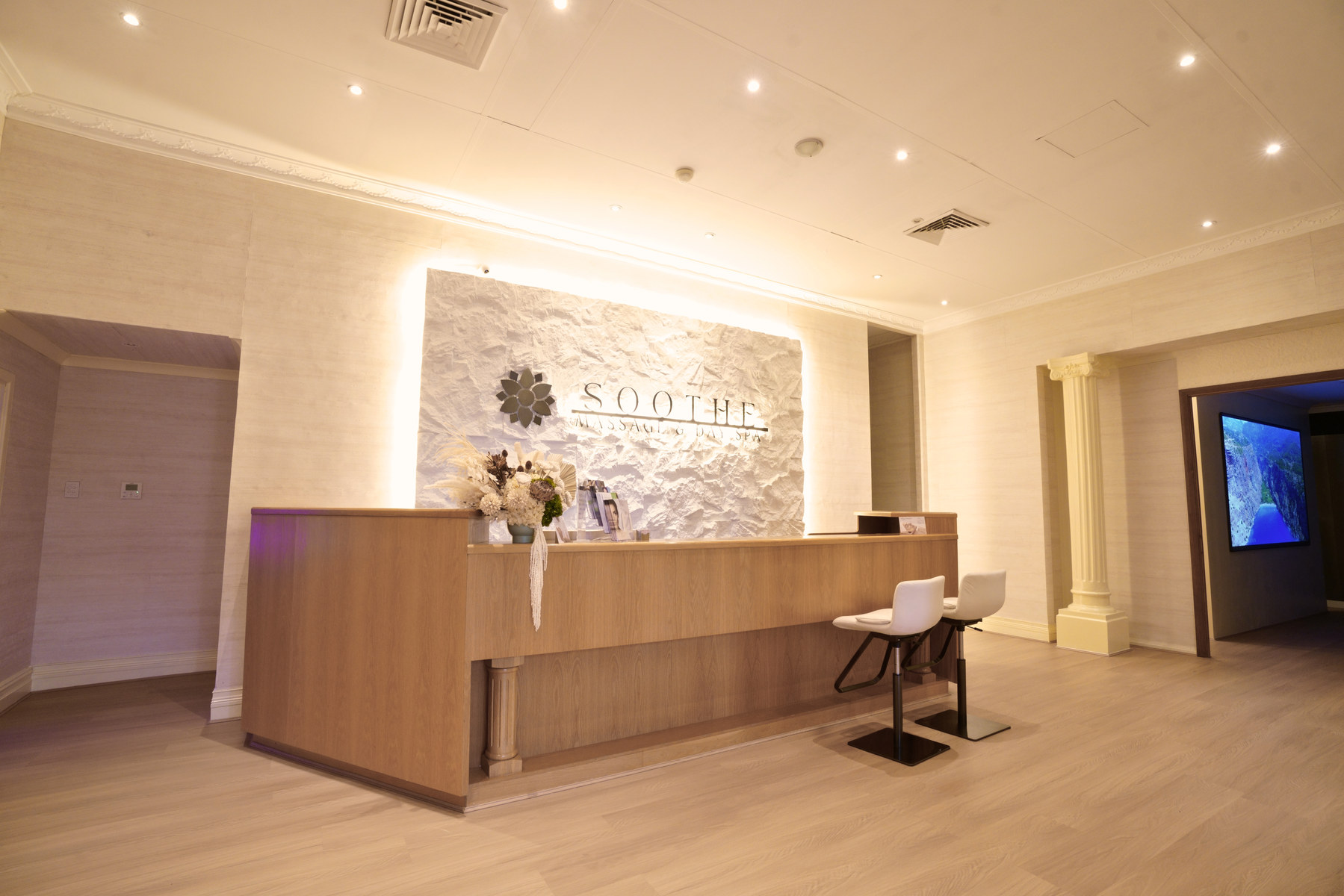 The full reception desk and open arrival area at SOOTHE Nedlands