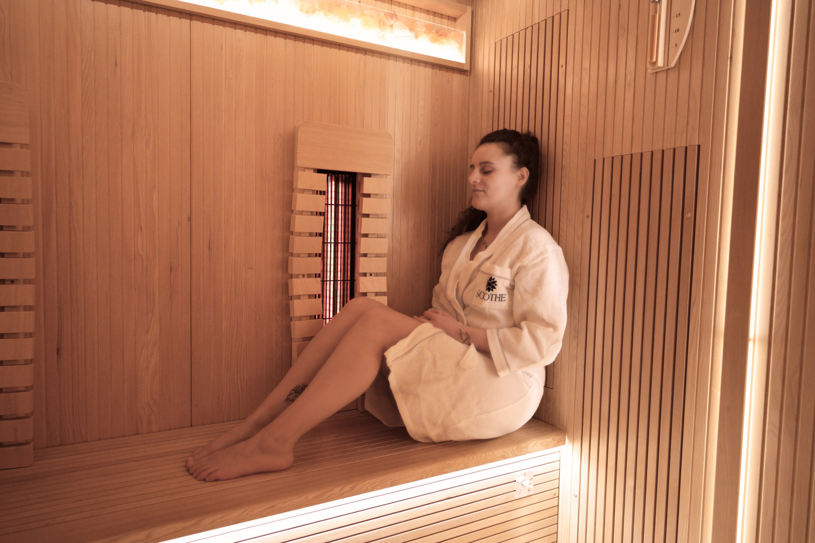A guest relaxing in the Nedlands sauna